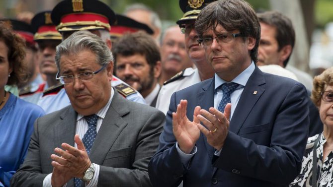 Zoido y Puigdemont.